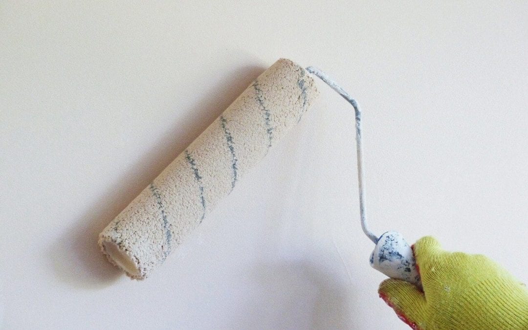 apply a primer to prepare walls for painting